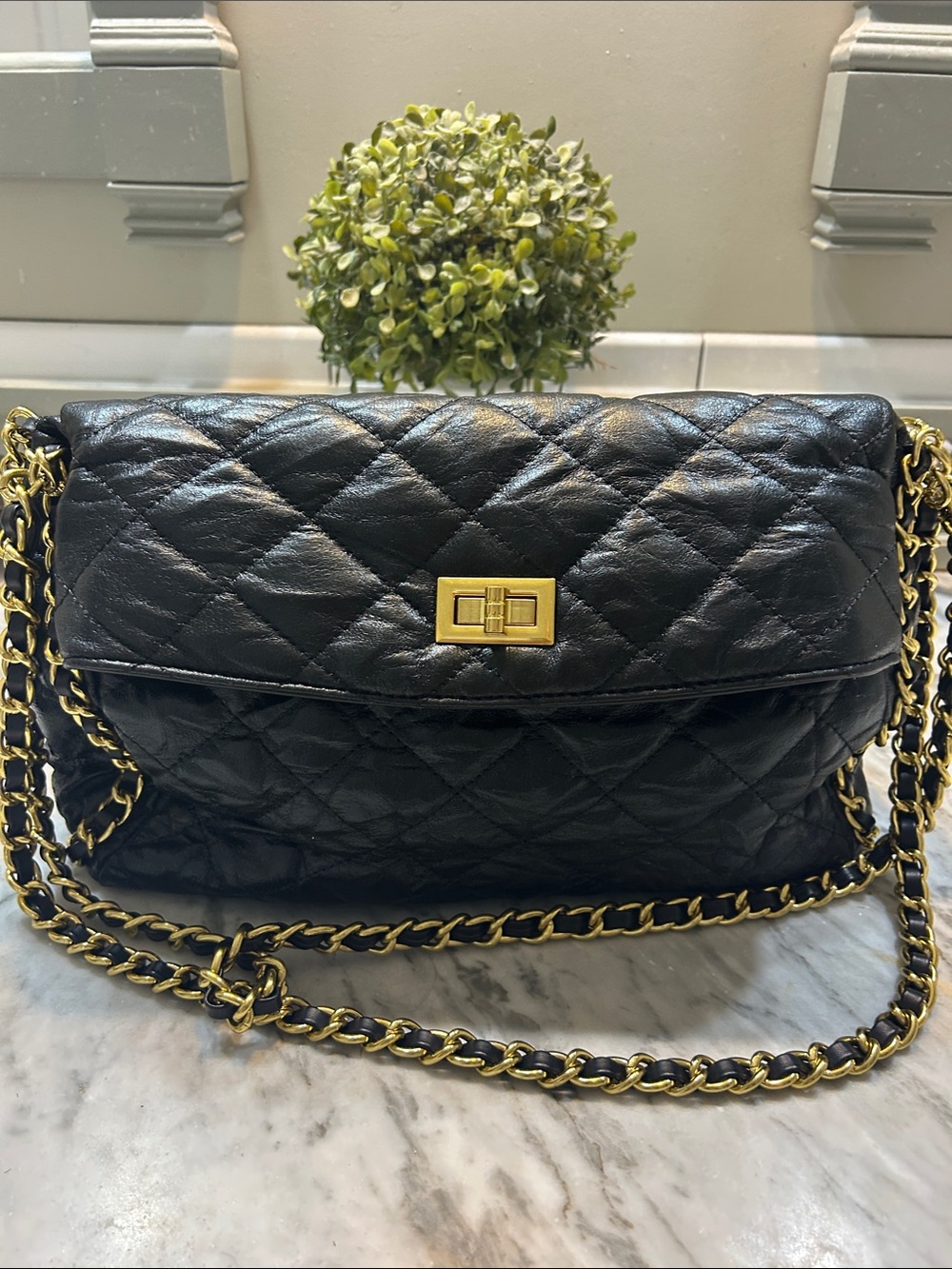 Black Quilted Leather Shoulder Bag with Gold Chain